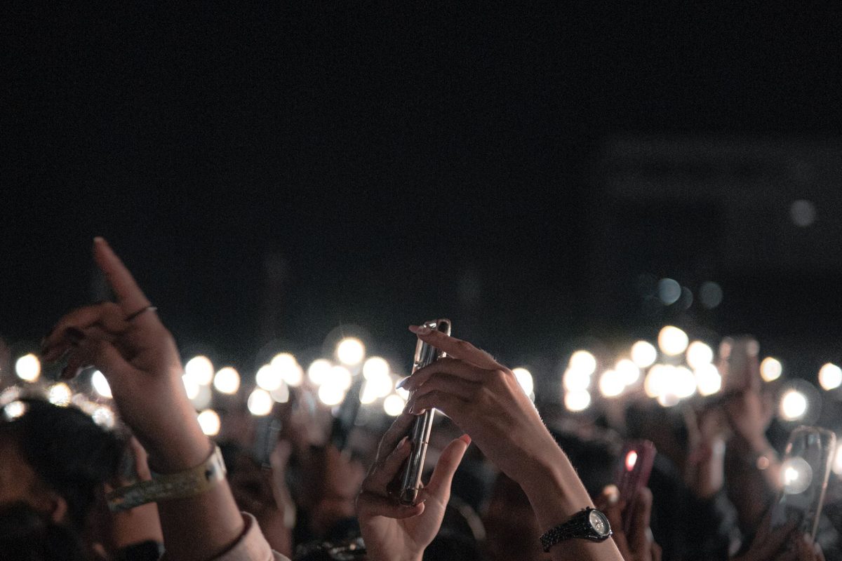 Phones held up during a concert